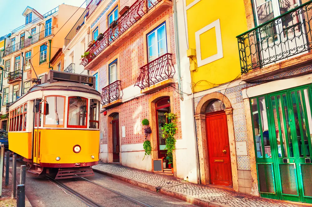 Tram and colorful houses in Lisbon, Portugal.