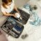 woman packing a bag for travel