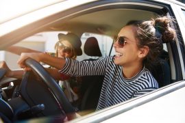 friends driving a car