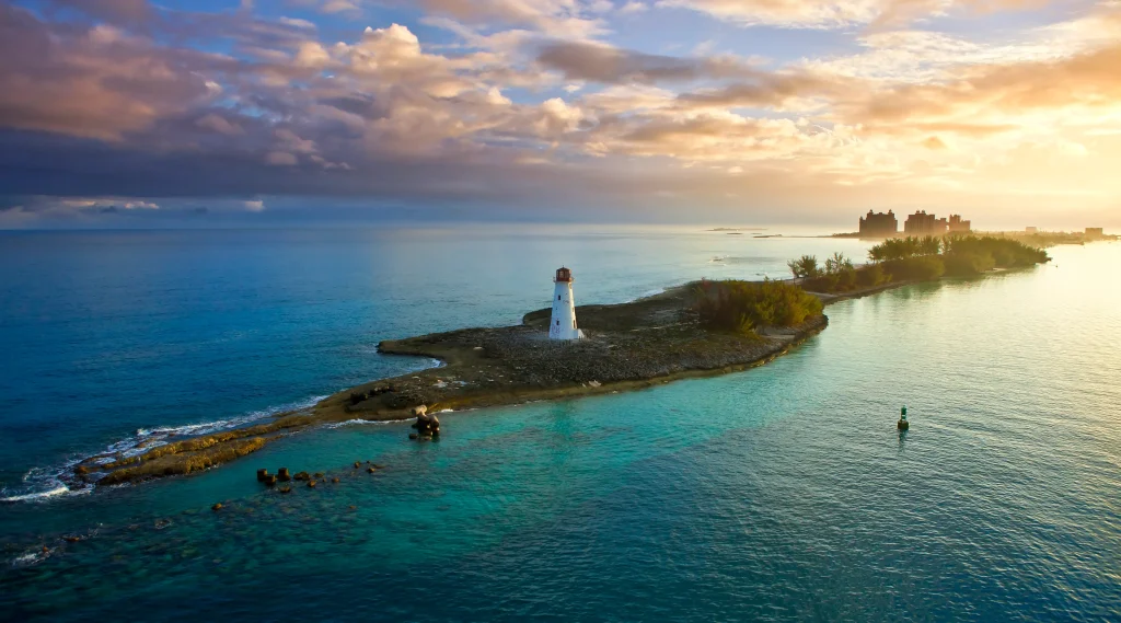 Aerial view of Nassau, showing the island, the sea, and the lighthouse.
