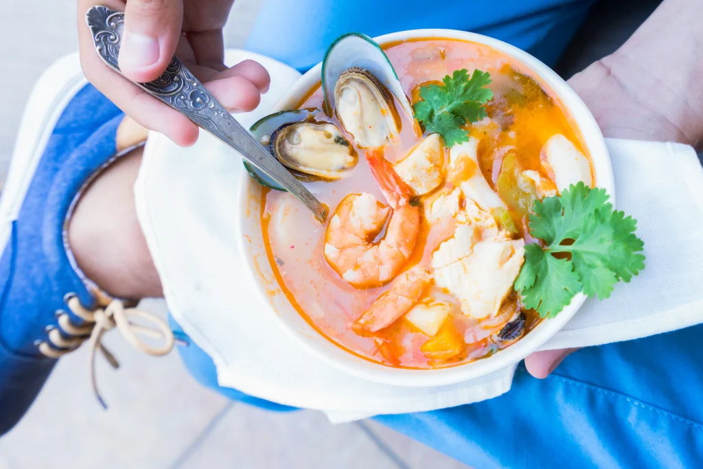 Picture shows a bowl of bouillabaisse, the famous seafood stew from Marseille.