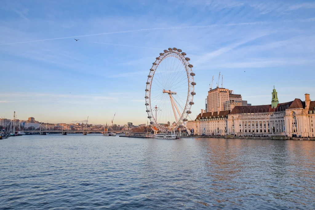 Image of the River Thames and the London Eye in London on a sunny day.