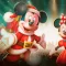 Mickey e Minnie Mouse de natal em um fundo verde