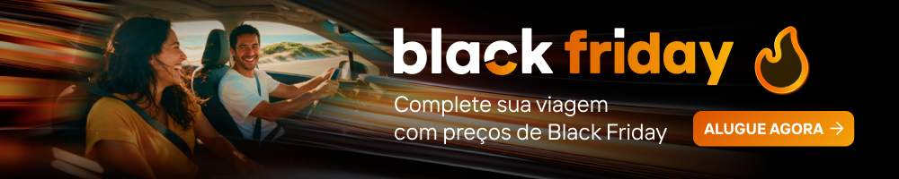 Banner de Black Friday com pessoas sorrindo ao fundo e texto “Complete sua viagem com preços de Black Friday”, botão “Alugue agora”, ambiente de promoção com elementos visuais de velocidade.